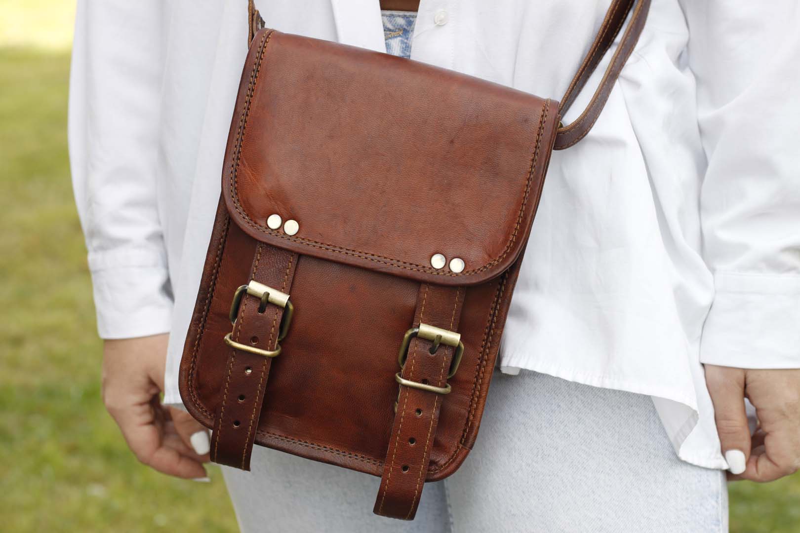Small long two buckle leather bag