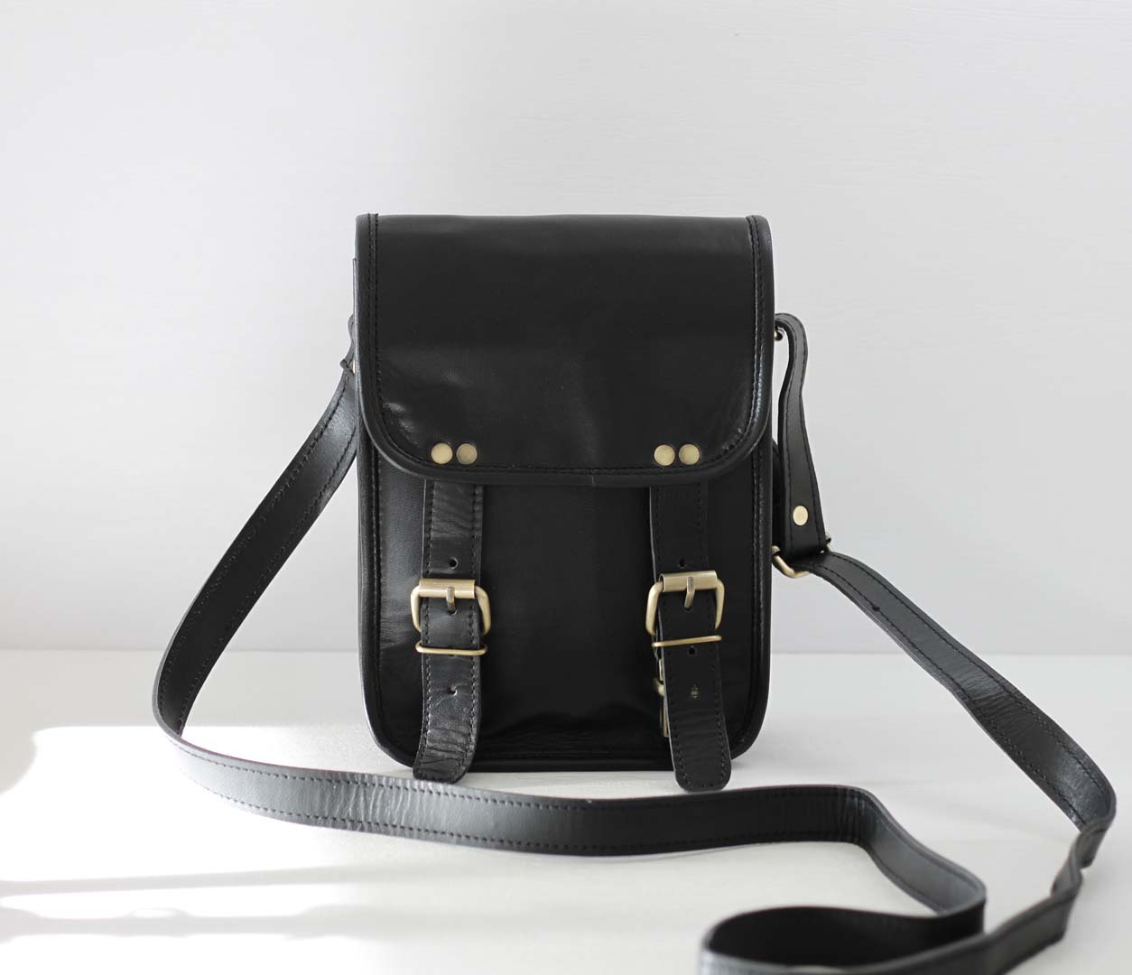 Personalised long two buckle black leather bag